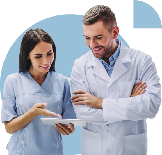 dental care providers looking at chart
