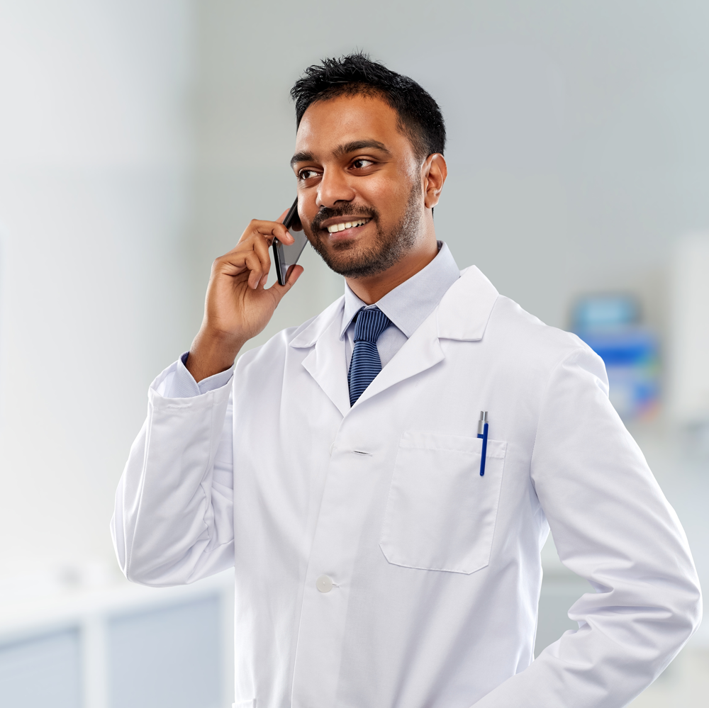 Dentist talking on the phone