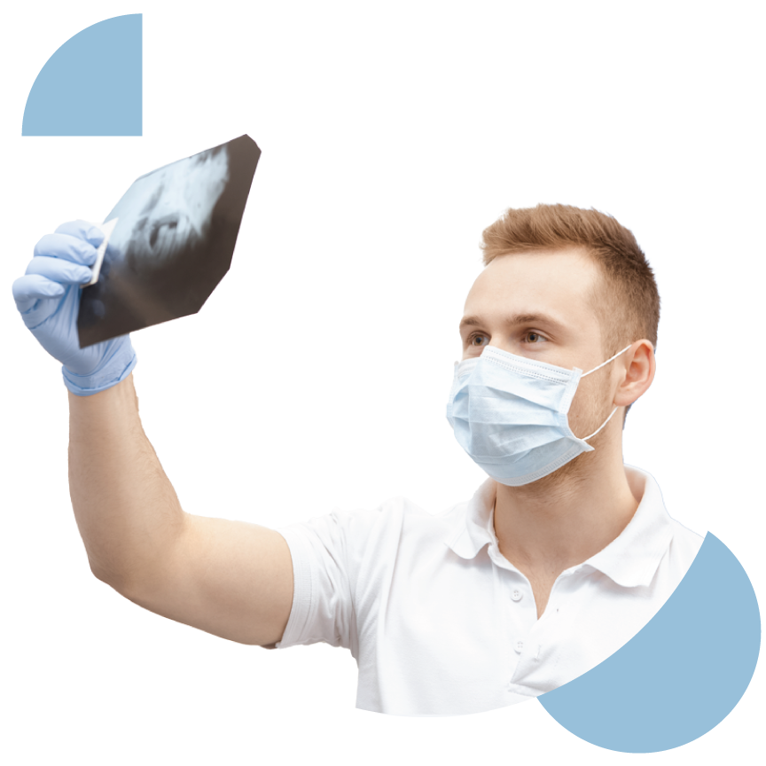 Dentist looking at panoramic xray