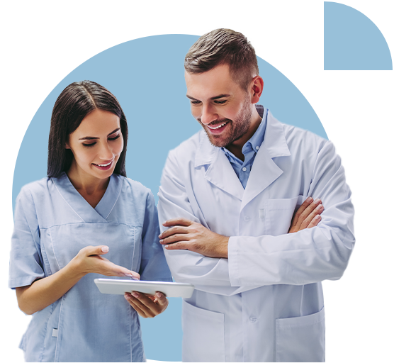 dental care providers looking at chart